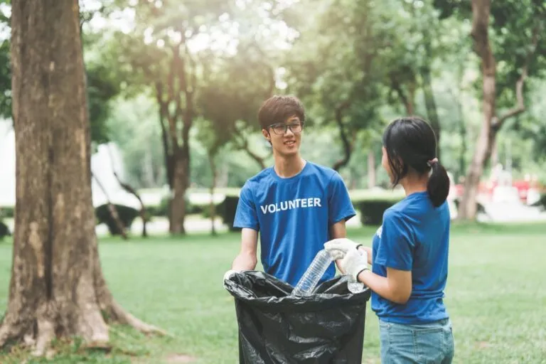 Home 6 Young,Asian,Volunteers,With,Garbage,Bags,Cleaning,Park,Area.,Ecology,